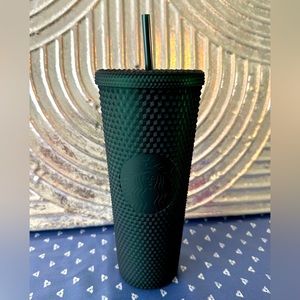 Starbucks green studded tumbler.